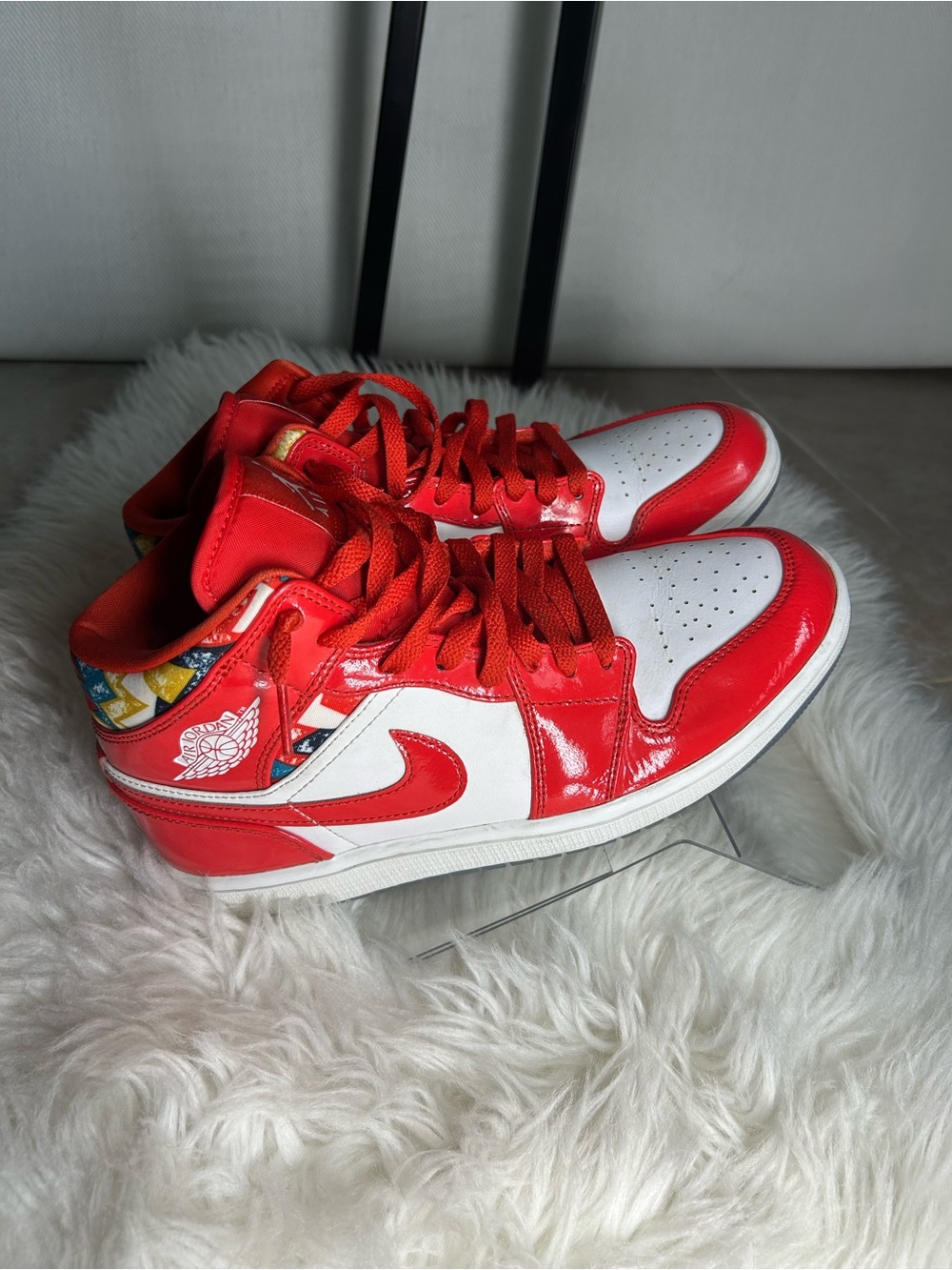 Jordan High-Top Sneakers in Red with Multicolor Heel Pattern